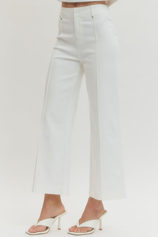 White HW Wide Leg Front Seam Pants shown; available in sizes XS–XL. Features front seam detail and wide leg.