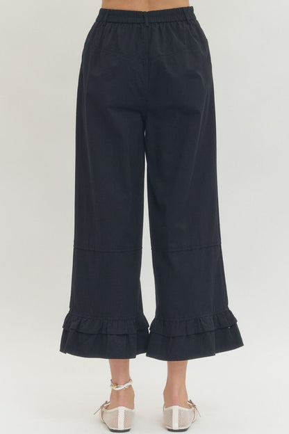 Black Straight Leg Ruffle Hem Pants, available in sizes XS-XL.