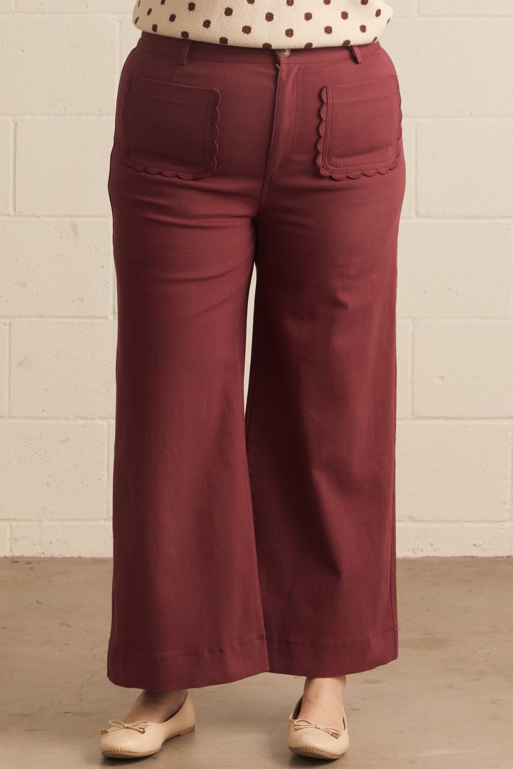 Madelyn Scallop Wide Leg Pants in maroon with scallop trim pockets; available in sizes XS–XL.