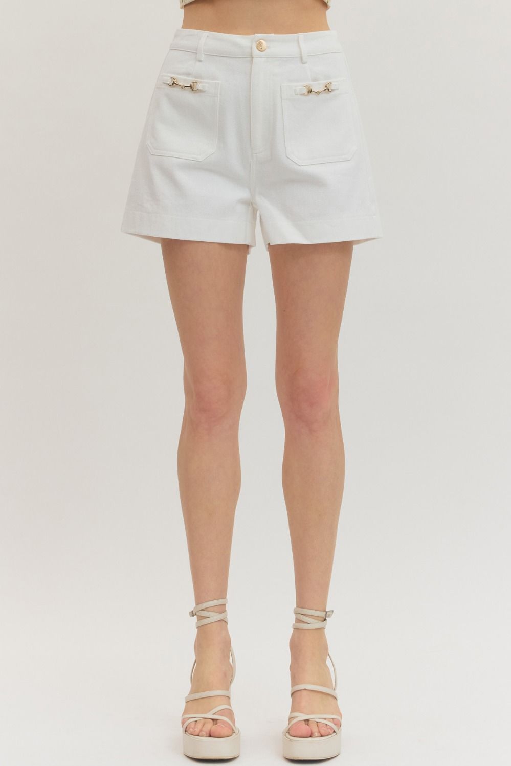 White Horse-bit Detail HW Shorts: high-waisted, white, front pockets, gold horse-bit. Sizes: XS-XL.