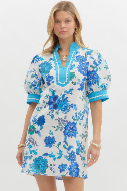 Blue Blossom Caftan Mini Dress: features blue floral prints, A-line silhouette, puffed short sleeves, blue trim on cuffs and neckline. Sizes available: XS, S, M, L, XL.
