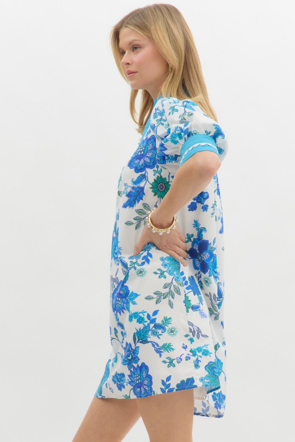 Blue Blossom Caftan Mini Dress with blue and turquoise floral patterns, A-line silhouette. Sizes: XS, S, M, L, XL.