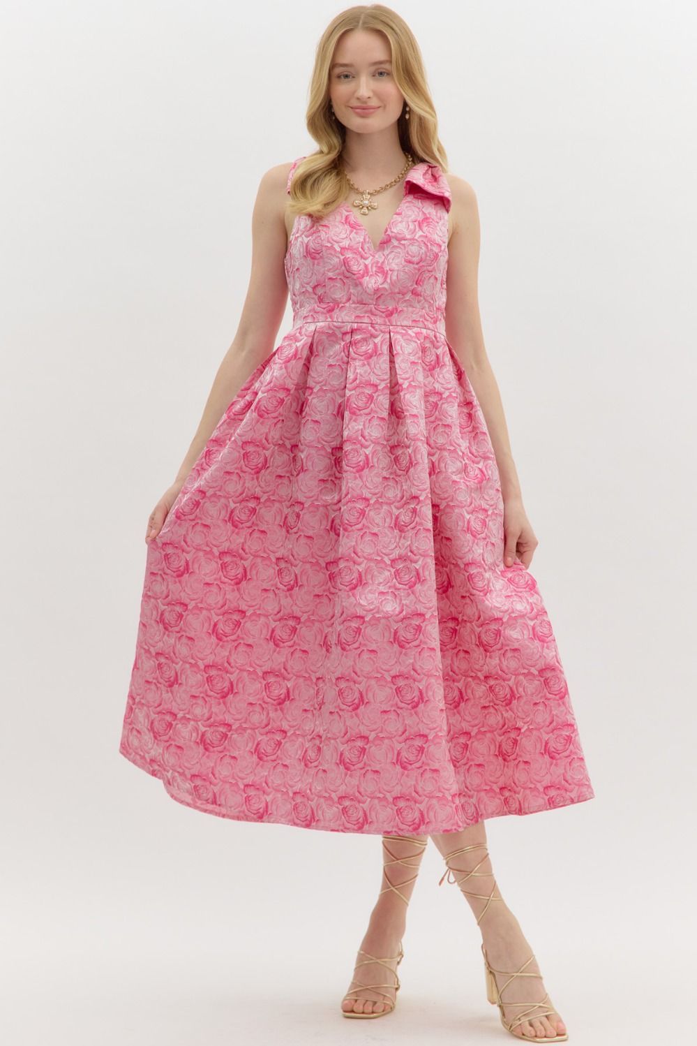 Carly Floral Print Bow Accent Midi Dress: V-neck, sleeveless, fitted bodice, flared skirt, bow detail. Sizes: XS, S, M, L, XL.