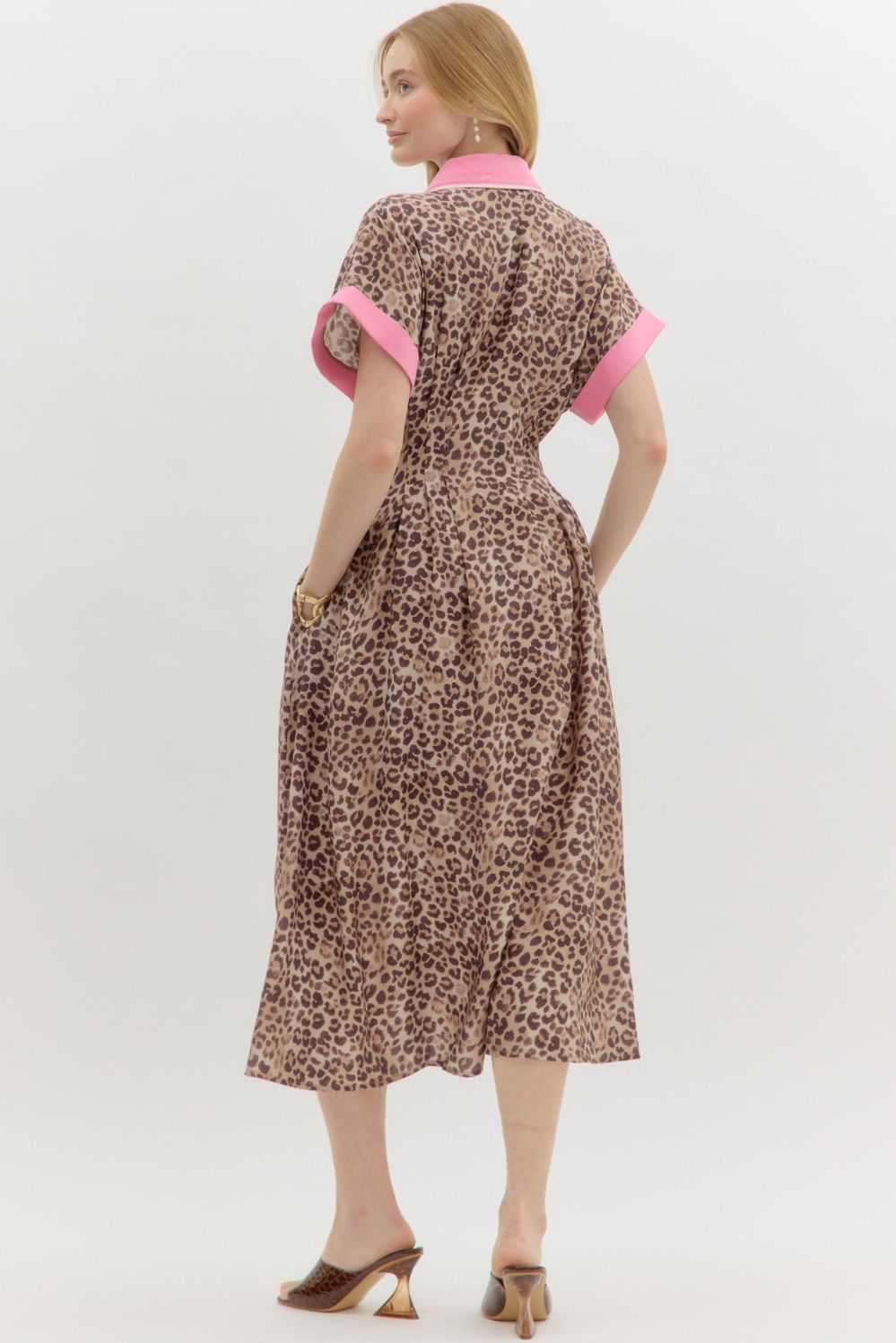 Michele Leopard Print Midi Dress features short sleeves, pink trim, and a collar. Available in sizes XS-XL.
