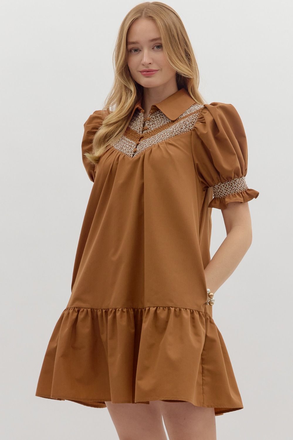Sylvie Golden Hour Dress: caramel embroidered, short puff sleeves, collar, lace chest detail, ruffled hem. Sizes XS-XL.