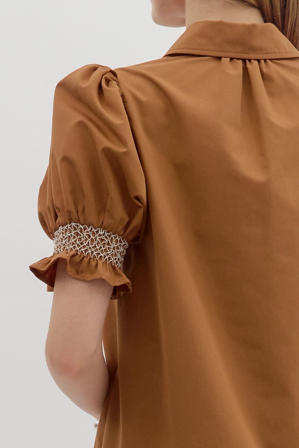 Sylvie Golden Hour Dress in caramel with short puffed sleeves, smocked cuffs; available in sizes XS–XL.