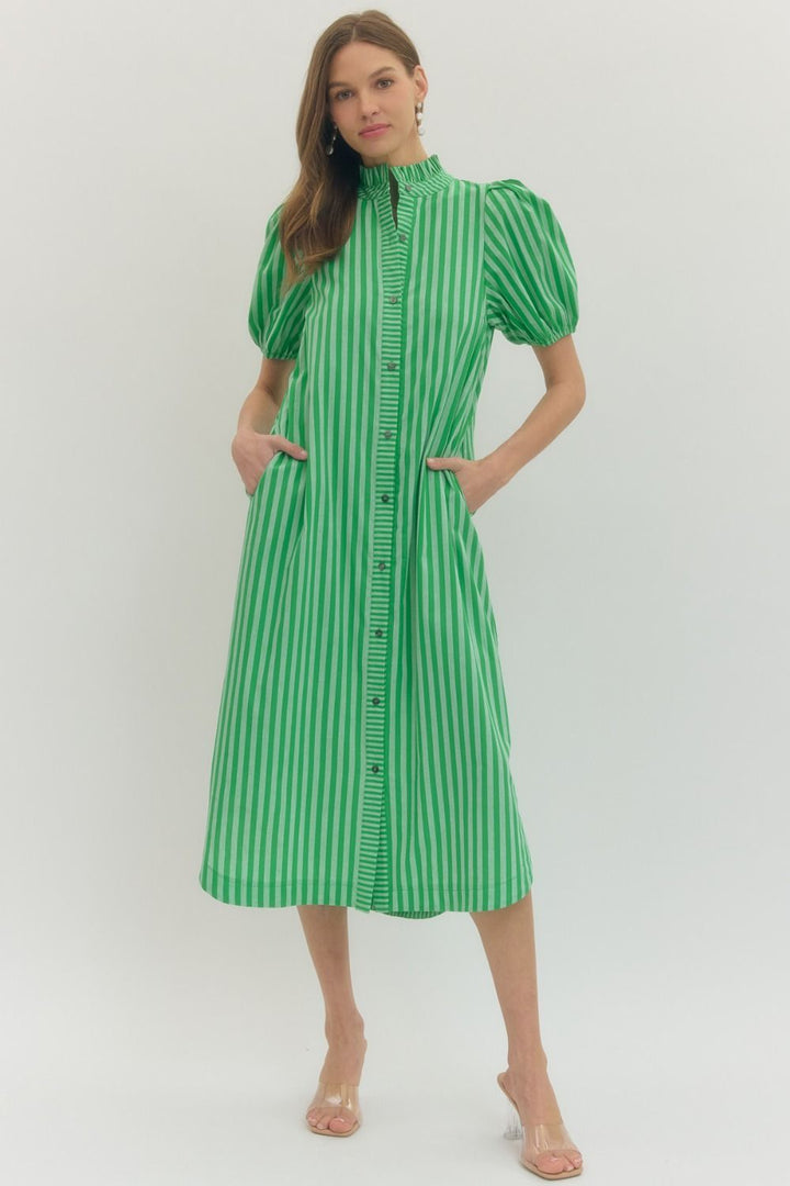 Green and white striped midi dress with ruffled neck, puff sleeves, pockets, button front. Available in sizes XS-XL.