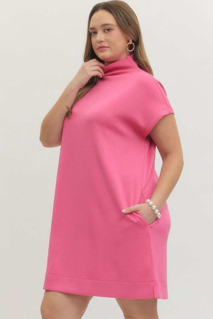 Pink Solid Mock Neck Pullover Dress with short sleeves and loose fit. Available in sizes XS-XL.