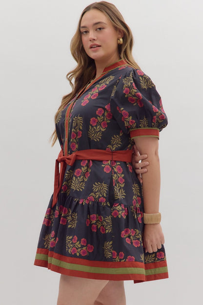 Angie Floral Puff Sleeve Ruffle Hem Dress: dark floral print, puff sleeves, ruffle hem, red belt, green-red trim. Sizes XS-XL.