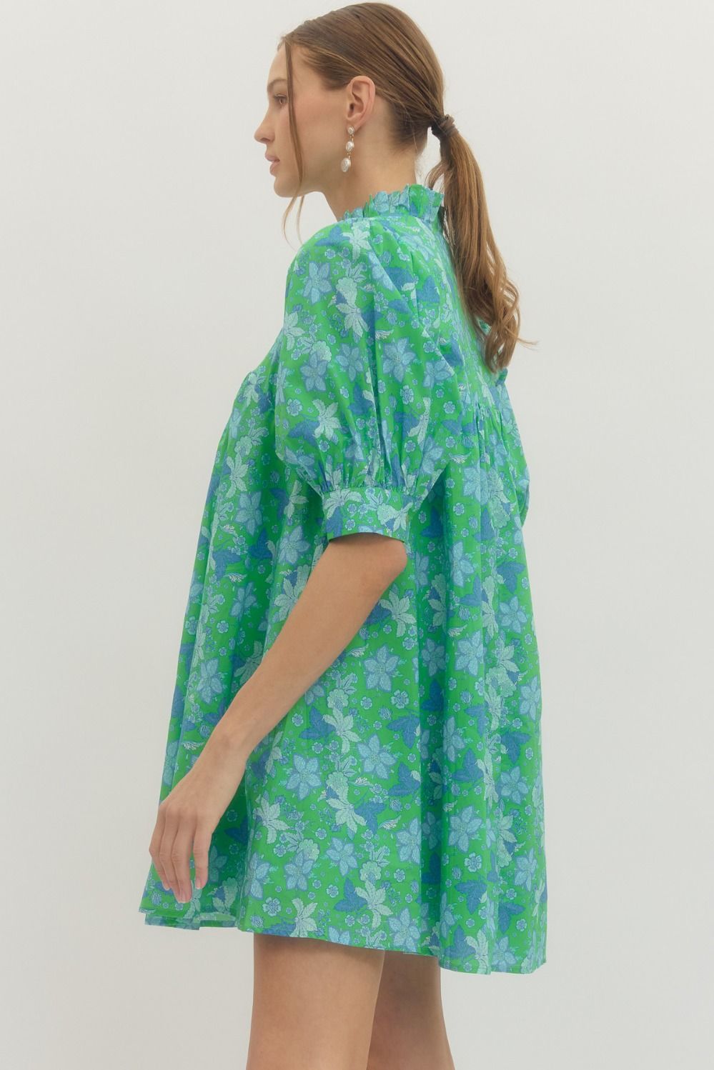 Green Floral Print Ruffle Stand Collar Dress with puffed half sleeves, blue pattern, loose fit. Available in S, M, L, XL.
