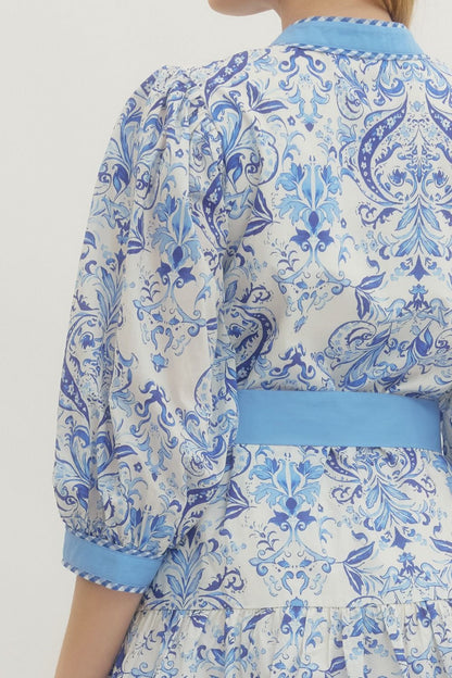 Royal Printed Long Sleeve Belted Dress with blue and white floral pattern, light blue belt. Available in sizes S-XL.