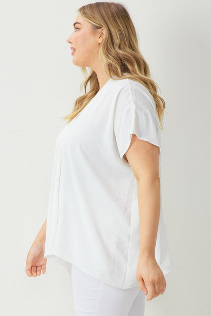 This product is a Maroon Solid V-Neck Short Sleeve Top. It's available in multiple sizes.