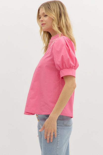 Garden Path Embroidered Top in bright pink with puffed sleeves; available in sizes XS-XL.