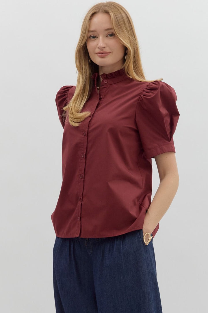Burgundy button-up bubble sleeve blouse, available in sizes XS-XL.