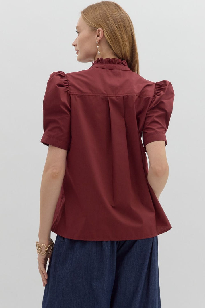 Burgundy Button-Up Bubble Sleeve Blouse with ruffled collar. Available in sizes XS–XL.