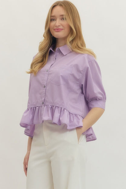 Lavender Ruffle Hem Button-Up Top, available in sizes XS–XL. Features ruffle hem and front buttons.