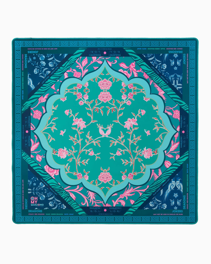 Square silk scarf with turquoise, teal, and pink floral motifs, blue borders, animal corners. Available in multiple sizes.