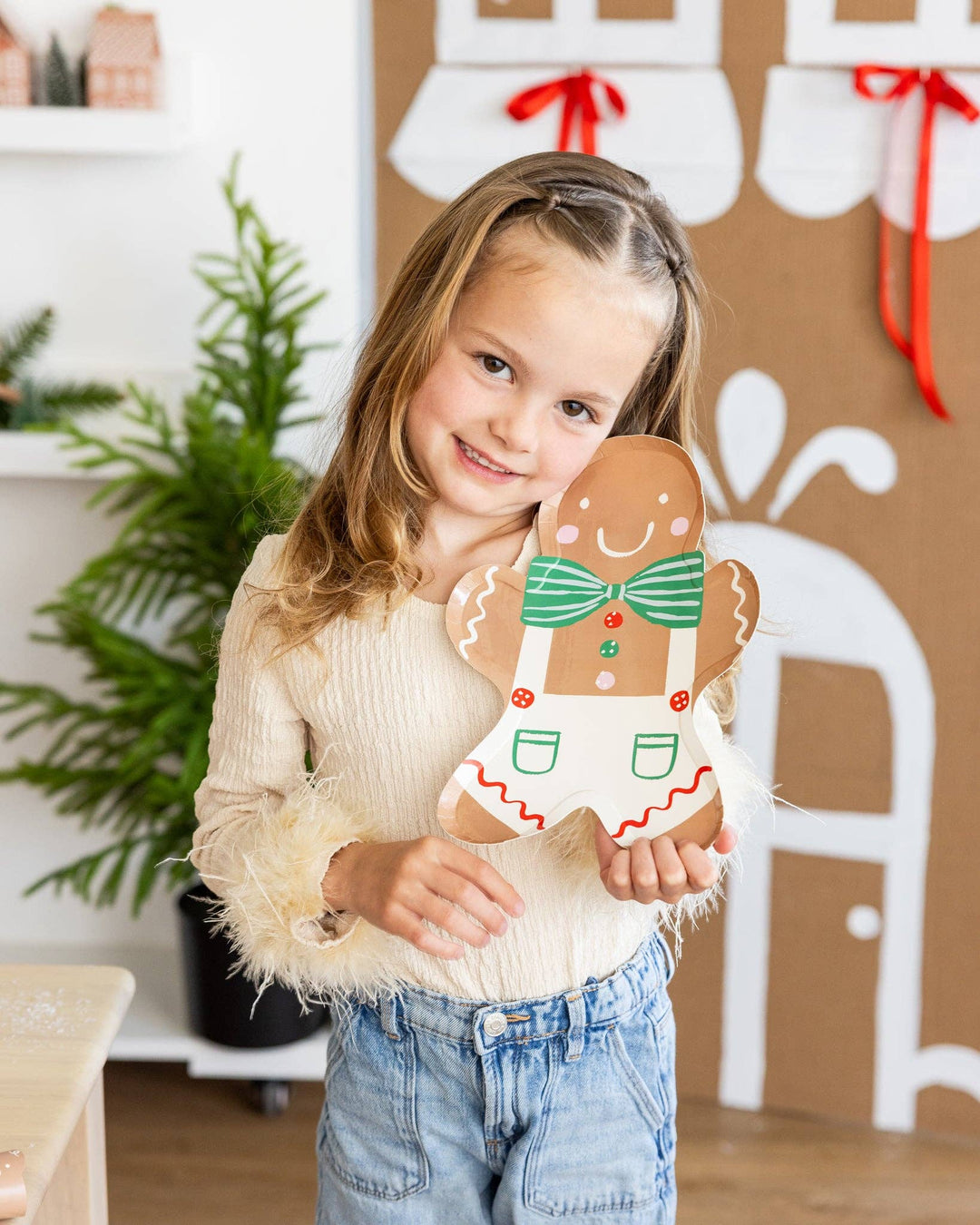 Gingerbread Man Plate with green striped bow tie, red buttons, and white overalls with red accents.