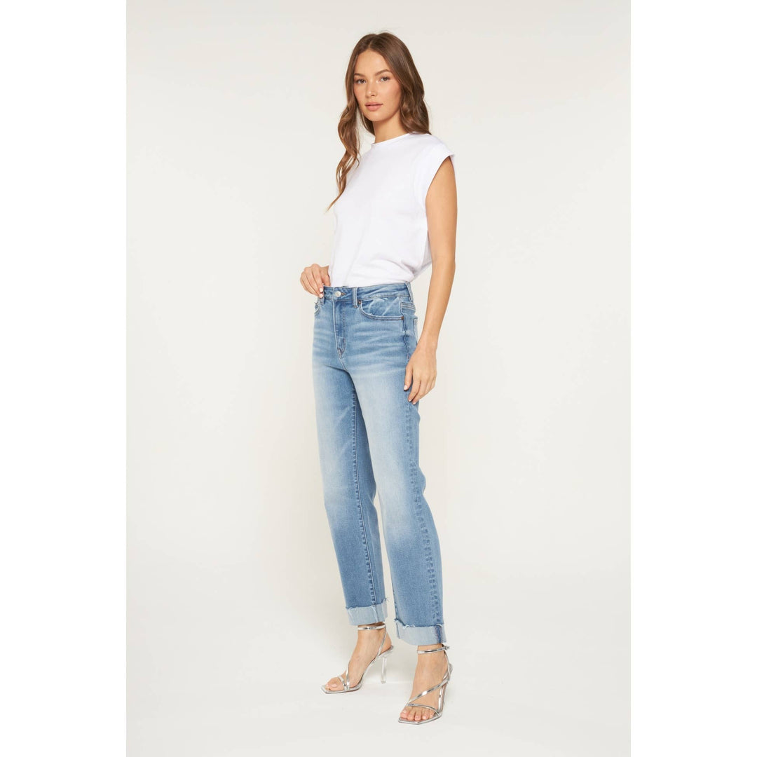 High-rise straight-leg blue jeans with a cuffed hem, size 31.