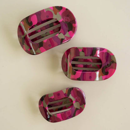 Garden Glam Large Flat Round Hair Clips in pink, purple, green, and brown camouflage patterns; available in large size.
