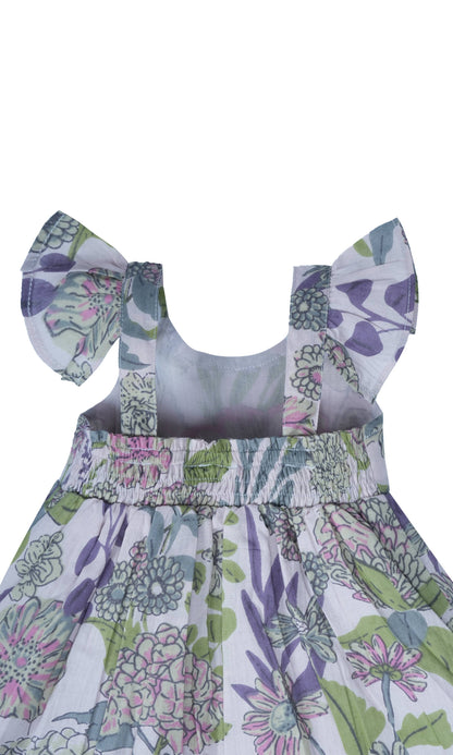 Sleeveless baby dress with ruffled straps, lavender floral print on white; available in sizes 0-3M to 24M.
