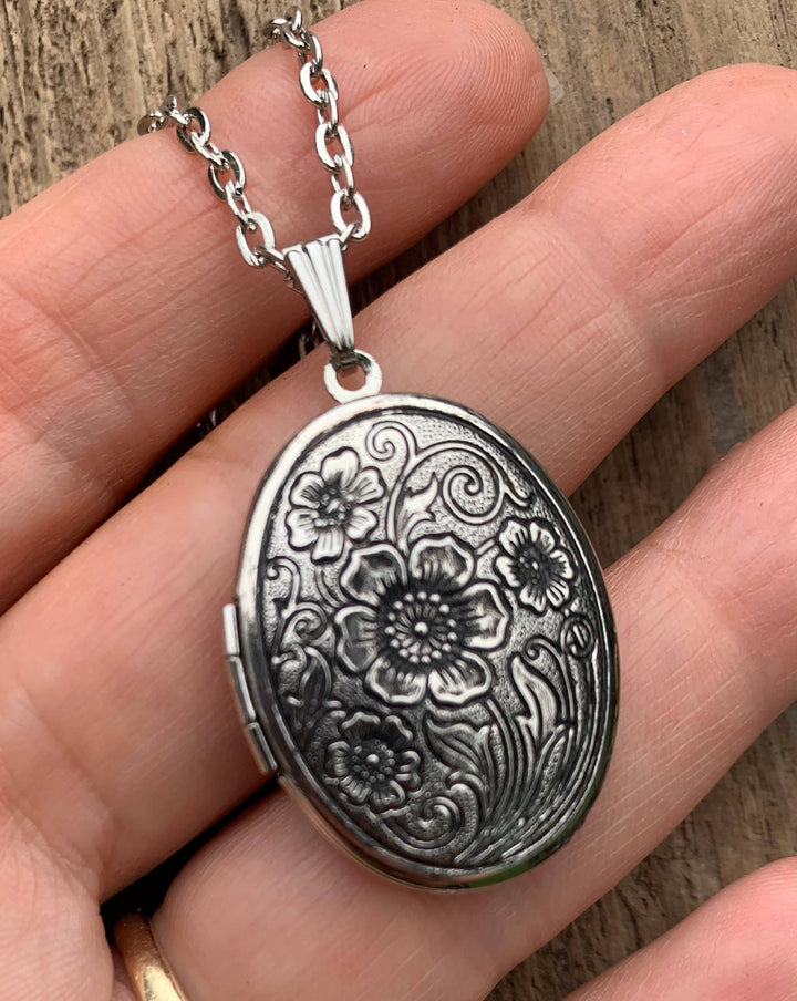 Vintage Style Antiqued Silver Locket with floral pattern, includes gardenia-scented solid perfume inside. Sizes: small, medium.