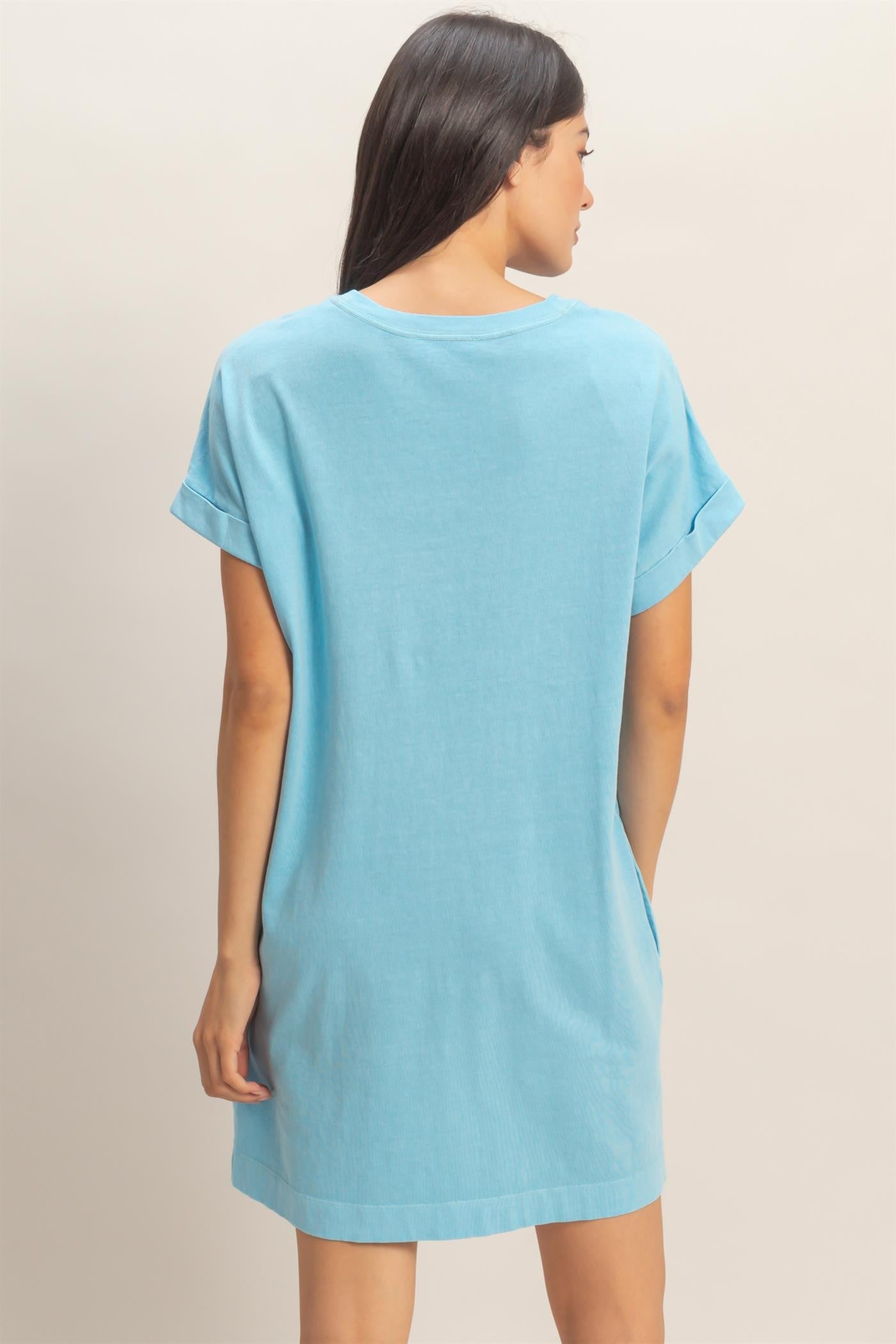 Relaxed Fit Crewneck T-Shirt Dress in light blue cotton, loose fit, short sleeves with rolled cuffs. Available in XS–XXL.