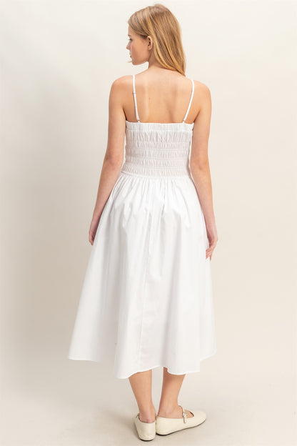 White Smocked Strapped Midi Dress with thin straps and smocked bodice. Available in sizes XS-XL.