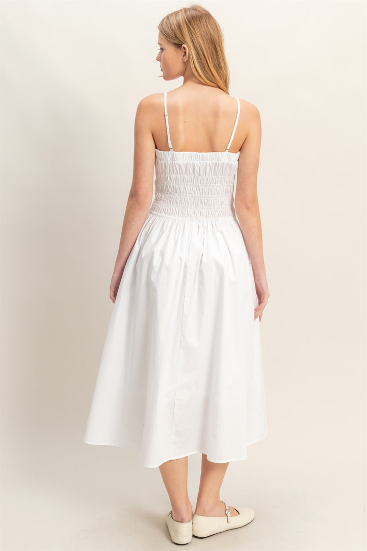 White Smocked Strapped Midi Dress with thin straps and smocked bodice. Available in sizes XS-XL.