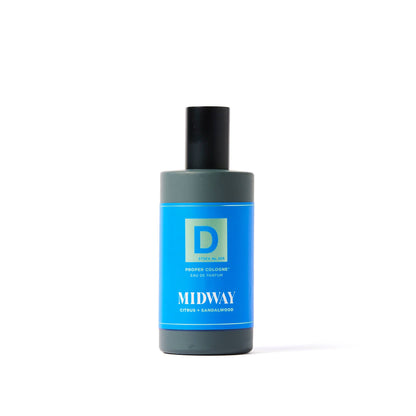Proper Cologne Midway: men's scent, blue label, black cap, green accents. Citrus/sandalwood notes. Available in multiple sizes.