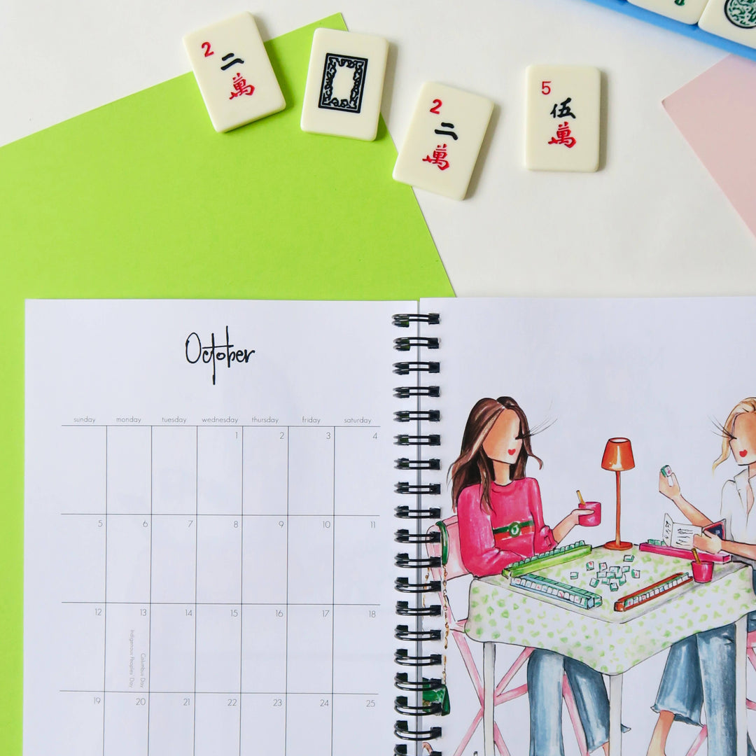 Spiral-bound 2025 Planner opened to October. Available sizes: small, medium, large.