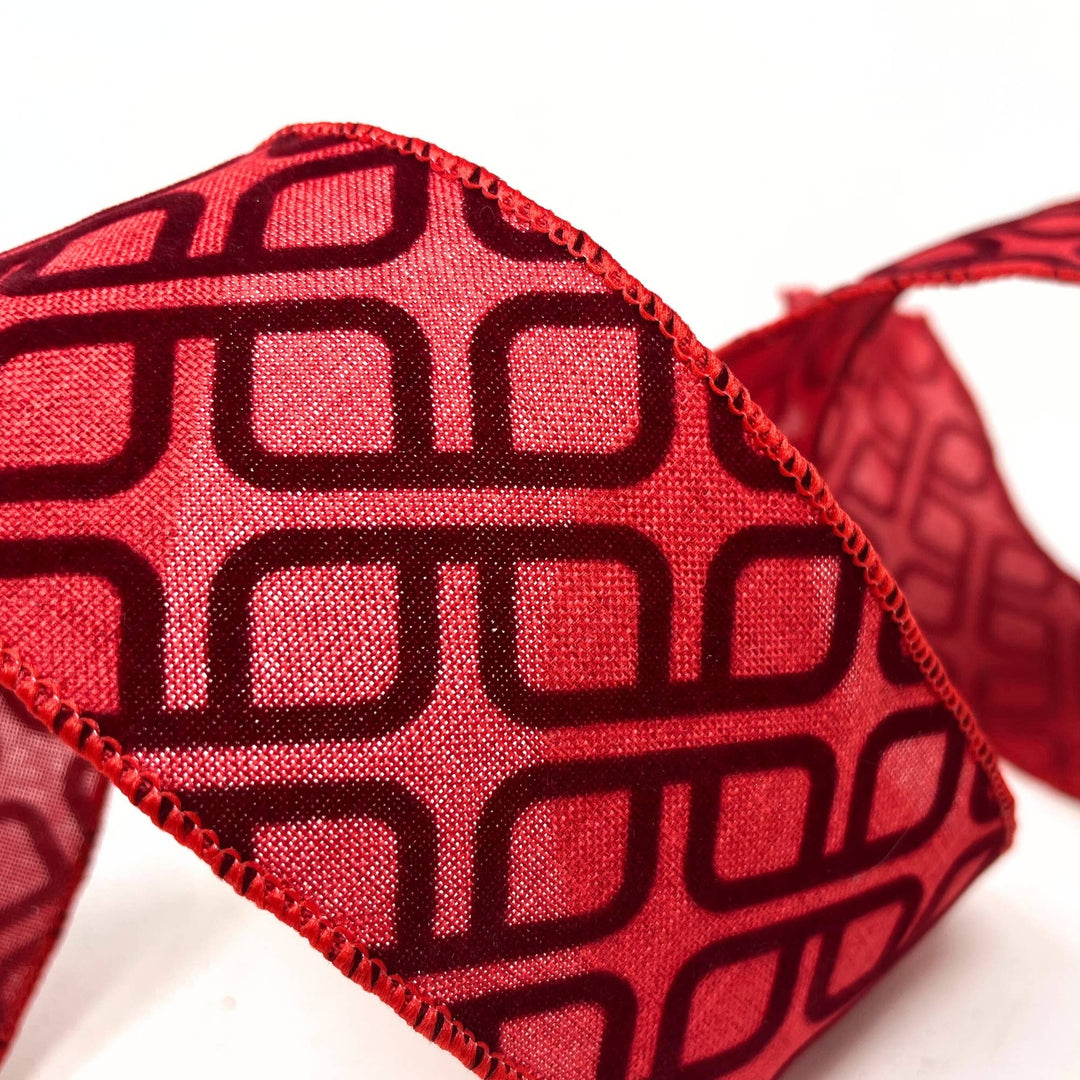 Brick Red W/ Flocked Geometric Pattern, 2.5″ x 10yd, with interlocking dark red rectangles and black edges.