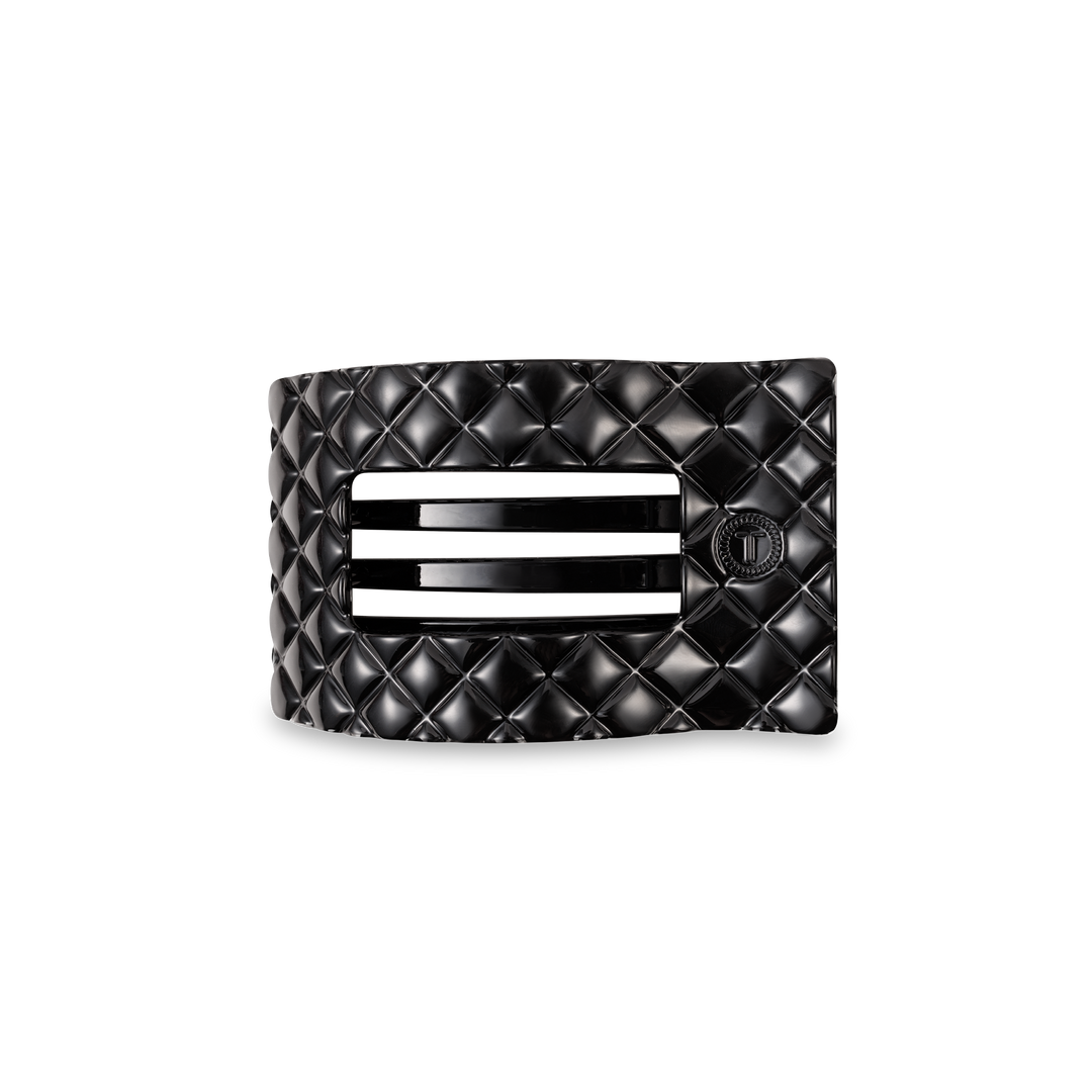 Black TELETIES Flat Rectangle Hair Clip, quilted pattern, 2 metal slots, round button; available in multiple sizes.