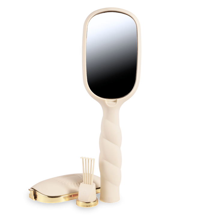 Cream and gold hand mirror with a twisted handle; available in small and medium sizes.