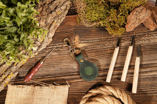 Genuine leather AirTag keychain case shown; available in multiple sizes.