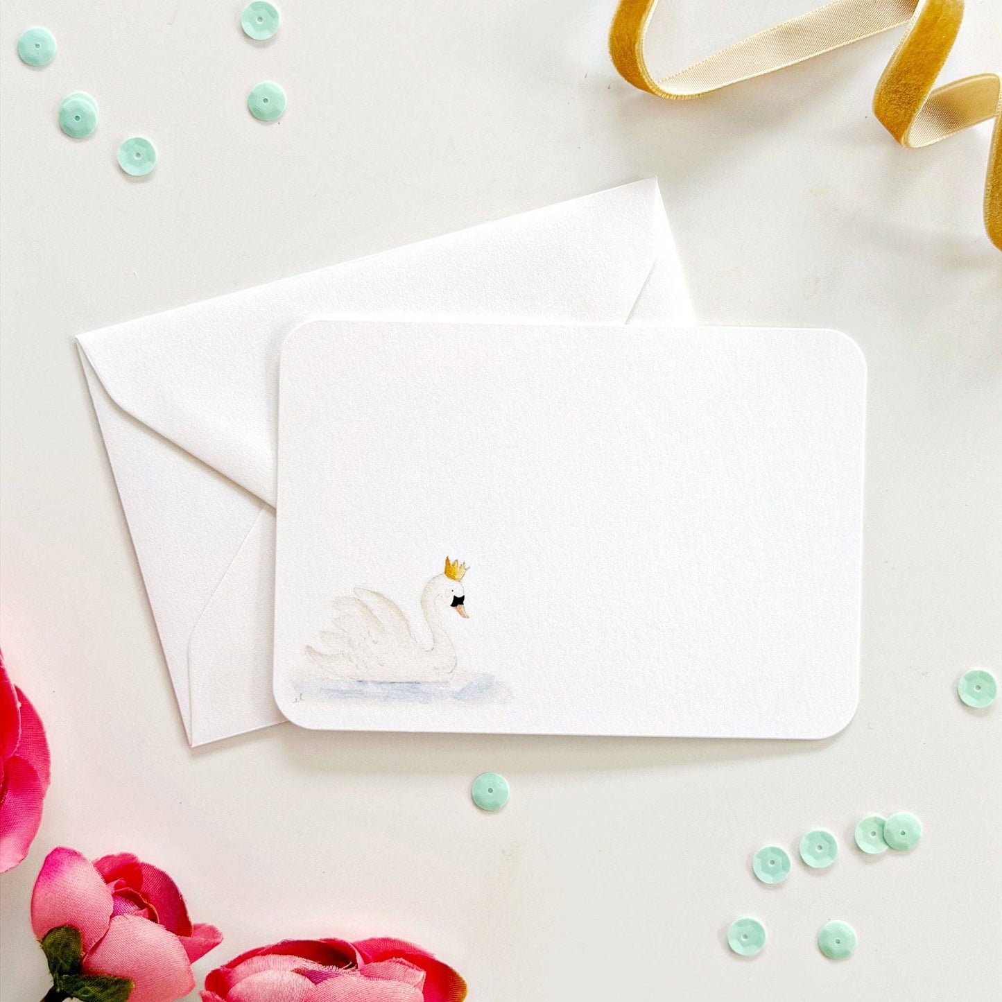 White watercolor notecards with crowned swan design, paired with white envelopes. Available in 4x6 and 5x7 inch sizes.