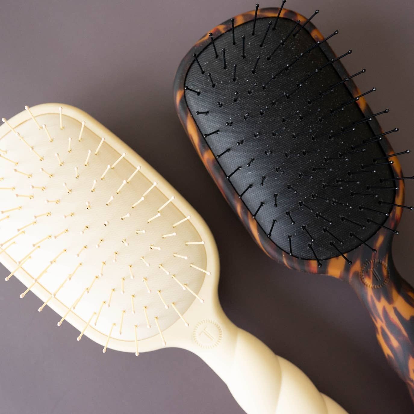 Detangler Hair Brush for Fine Hair | Tortoise, rectangular, cushioned base, tortoiseshell handle. Sizes: small, large.