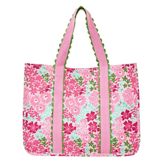 Spacious tote with pink, red, and white floral pattern, light pink handles, green trim. Available in S, M, and L.