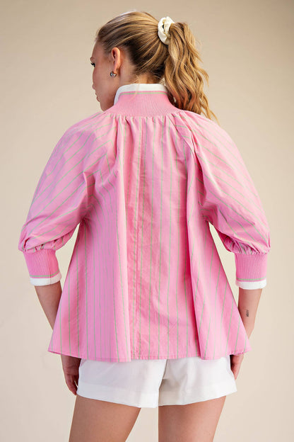 Pink Mock Neck Band Puff Sleeve Blouse shown from back. Available in sizes XS–XL.