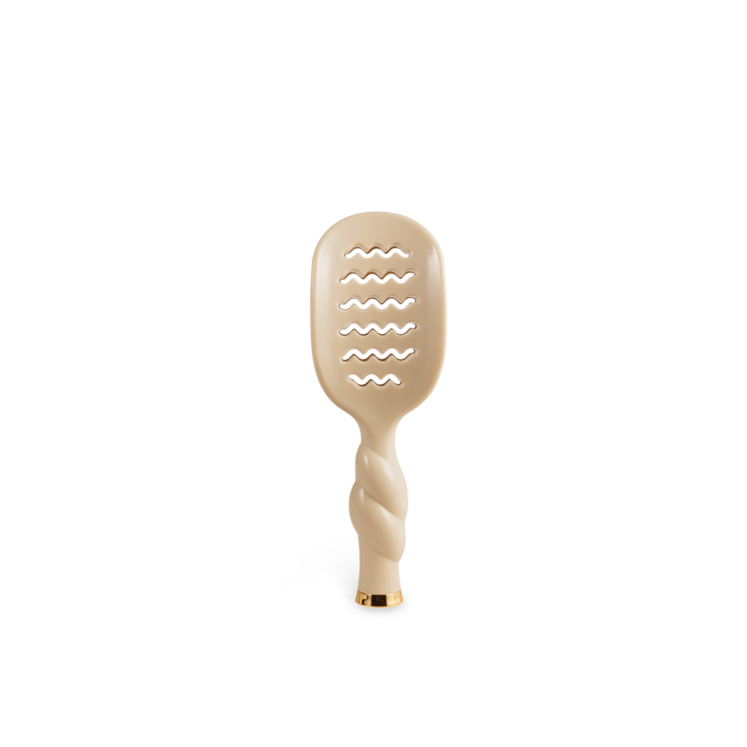 The Mini Vented Brush | Tan, with a twisted handle and wavy vents, is ideal for short hair; available in mini size.