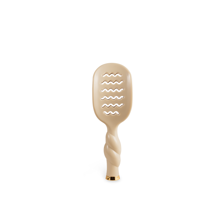 The Mini Vented Brush | Tan, with a twisted handle and wavy vents, is ideal for short hair; available in mini size.