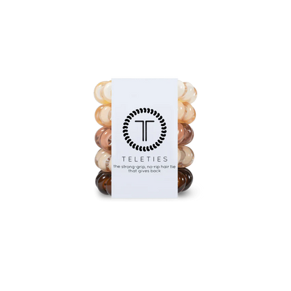 TELETIES Hair Ties in neutral colors offer strong grip and no-rip functionality. Sizes available: Small, Large.