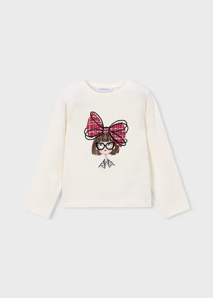 Little Girl Doll Long Sleeve T-Shirt with cartoon girl, large glasses, and big red bow. Available in sizes S, M, L, XL.