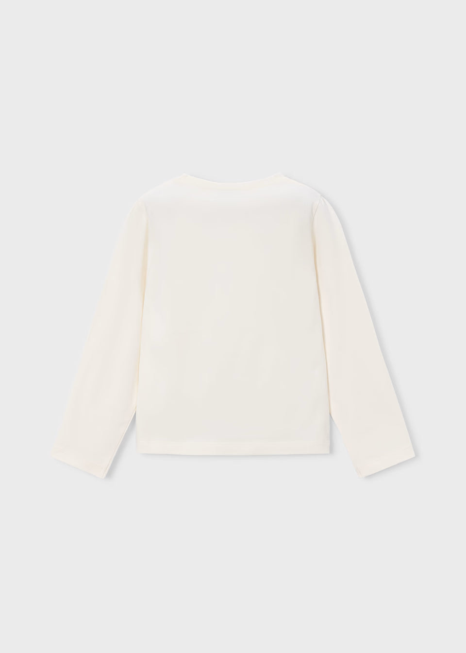 Back view of off-white long sleeve T-shirt with bow. Available in sizes 2T to 6X.