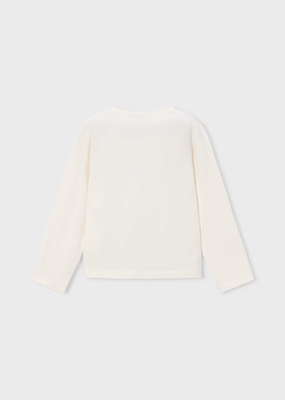 Back view of off-white long sleeve T-shirt with bow. Available in sizes 2T to 6X.