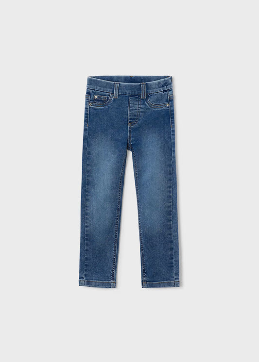 Little Girl Denim Skinny Fit Jeans in light blue with front pockets, belt loops, pull-on style, and adjustable waistband. Available in kids’ sizes.