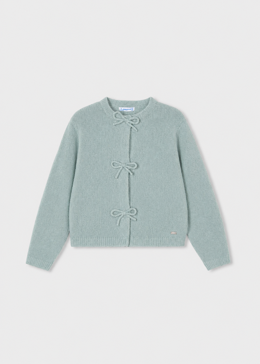 Light blue long-sleeve cardigan with three front bow closures, crew neckline, and small metallic logo tag near the hem. Available in sizes 2T-6X.
