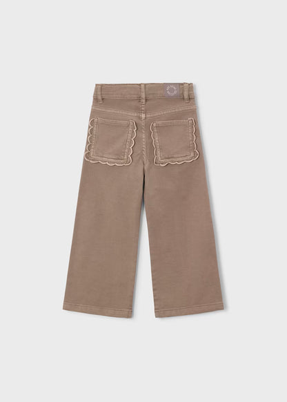 Khaki twill scallop pants with wide legs and two back pockets featuring scalloped edging; available in sizes 2T-6.