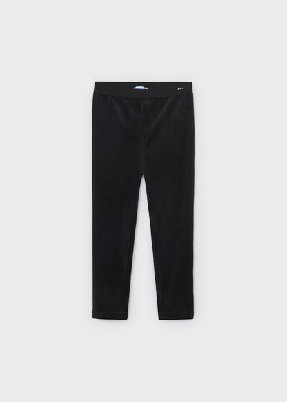 Little Girl Velvet Leggings in ultra-soft black velvet with an elastic waistband, ankle length, no visible pockets or embellishments. Available in sizes 2T-6X.