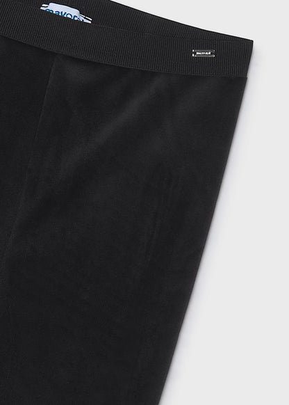 Black Little Girl Velvet Leggings with a stretchy elastic waistband and small rectangular label near the top edge, made from ultra-soft velvet. Available in sizes 2T–6X.